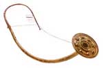 Ancient curved Lur horn, a bronze age wind instrument, showcasing intricate details.