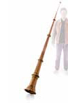 Antique wooden alphorn against a white background, demonstrating a brass instrument.