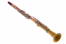 Bb clarinet isolated on a white background, angled view.