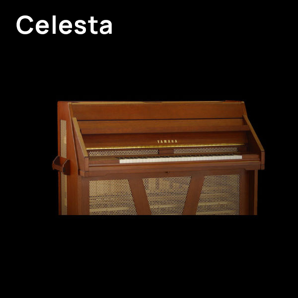 A brown wooden Yamaha Celesta, a keyboard musical instrument resembling an upright piano, with visible white and black keys and a gold Yamaha logo.