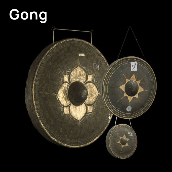 Three gongs of varying sizes against a black background, showcasing intricate golden patterns and bosses, used as musical percussion instruments