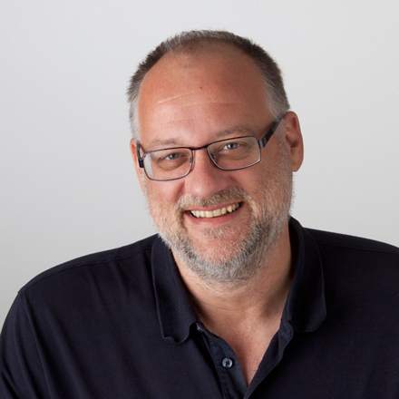 Herbert Tucmandl, CEO and Founder, smiling.