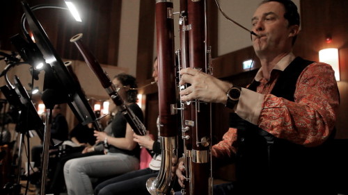 Musicians playing bassoons in an orchestra setting for Vienna Symphonic Library Synchron Instruments.