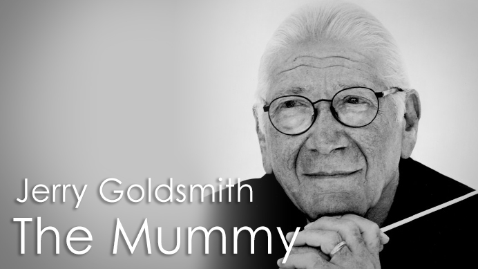 Black and white photo of Jerry Goldsmith, the composer of The Mummy (1999), wearing glasses and holding a conductor's baton.
