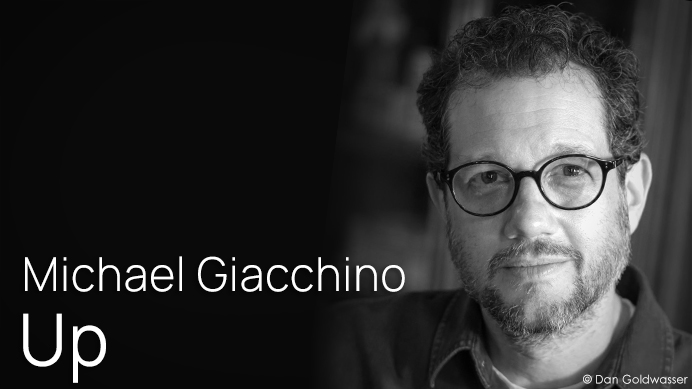 Headshot of film composer Michael Giacchino, featured for his work on Disney Pixar's Up.