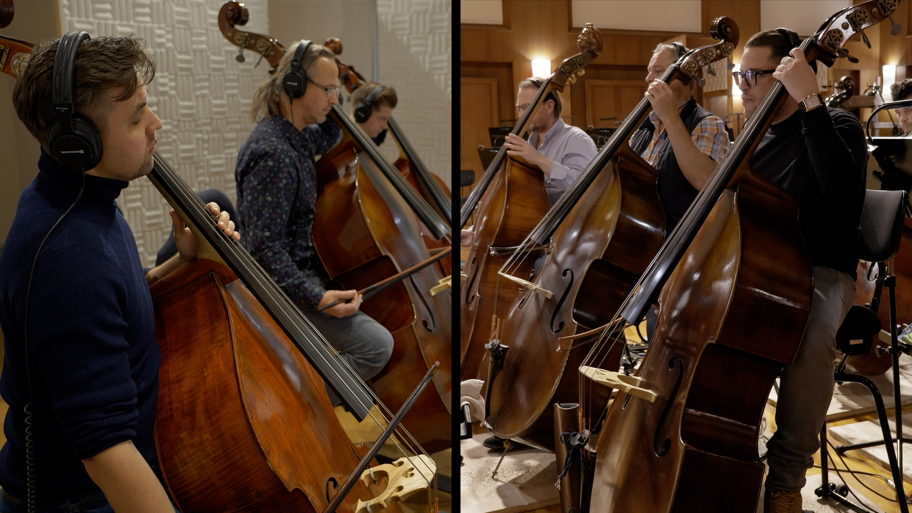 Orchestra musicians playing double basses in a recording studio.