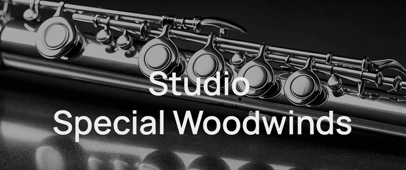 Close-up, black and white image of a silver flute with keys and pads visible. The text Studio Special Woodwinds is overlaid in white.
