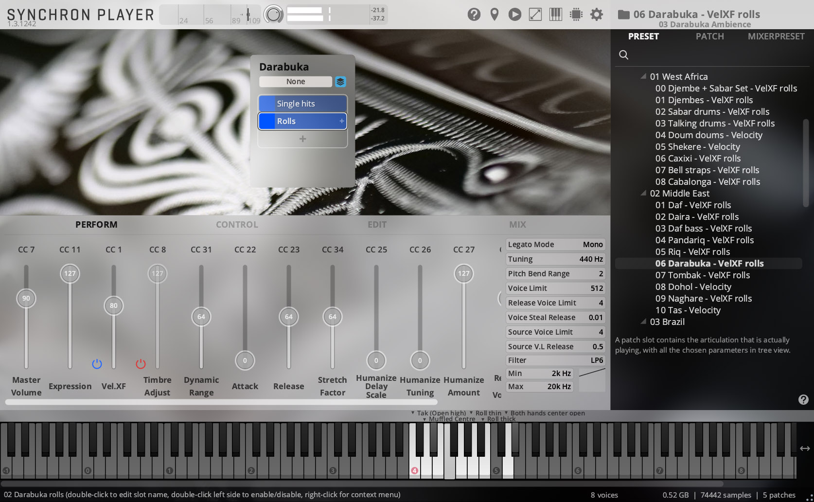 A detailed screenshot of the SYNCHRON PLAYER 1.3.1242 software interface, showing 06 Darabuka - VelXF rolls highlighted under the Middle East category in the preset list and Rolls selected for Darabuka in the instrument module, with various faders and controls visible for Perform, Control, Edit, and Mix settings, alongside a piano keyboard at the bottom.