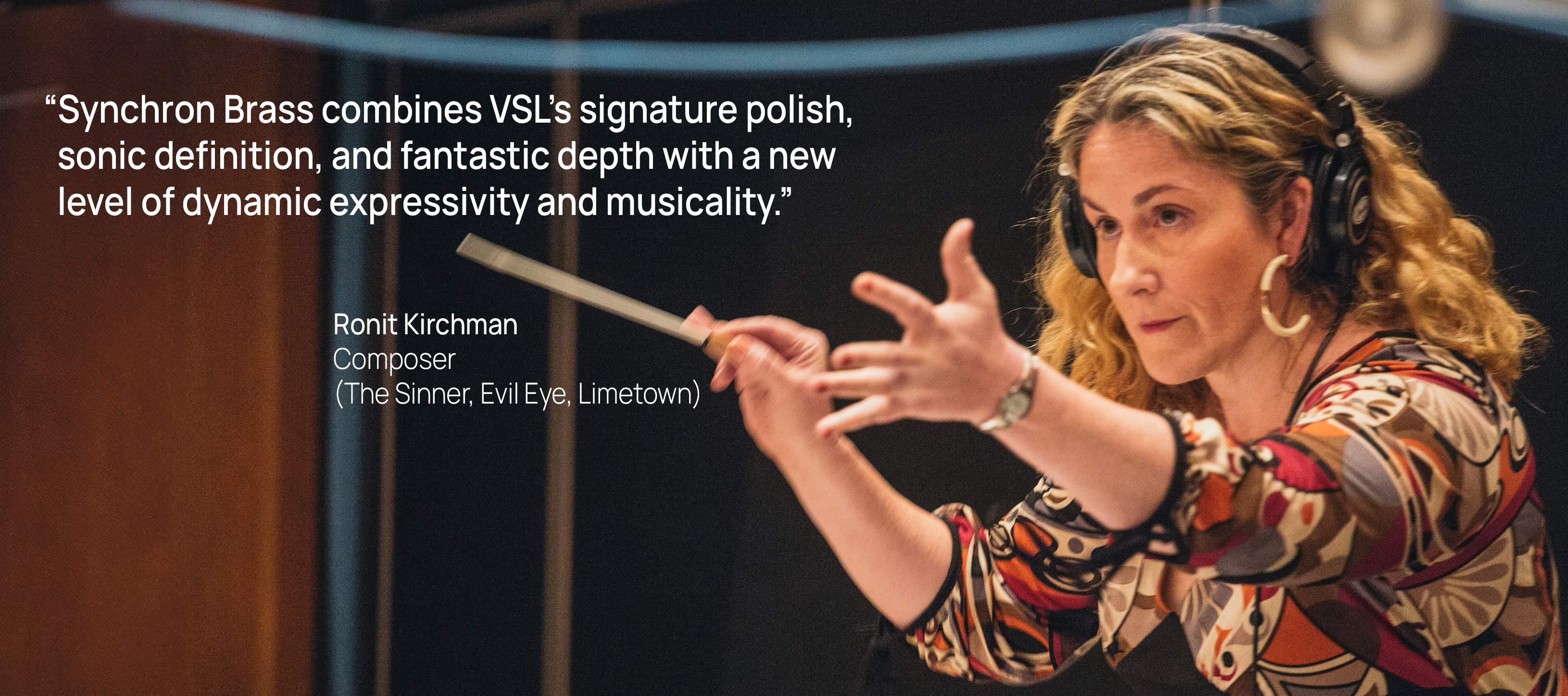 Composer Ronit Kirchman conducting with hands and a baton while wearing headphones, promoting Synchron Brass library from VSL.